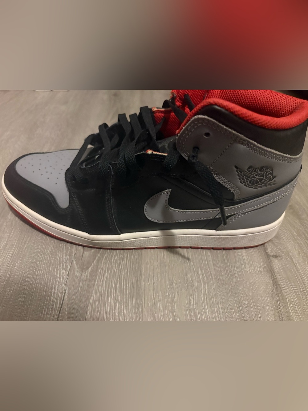 Nike Jordan Air 1 Mid Men’s 12 Black and Red Sneaker with Gray Swoosh